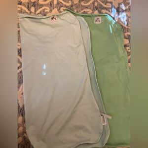TWO Ollie Swaddles in Blue & Green. One size fits all